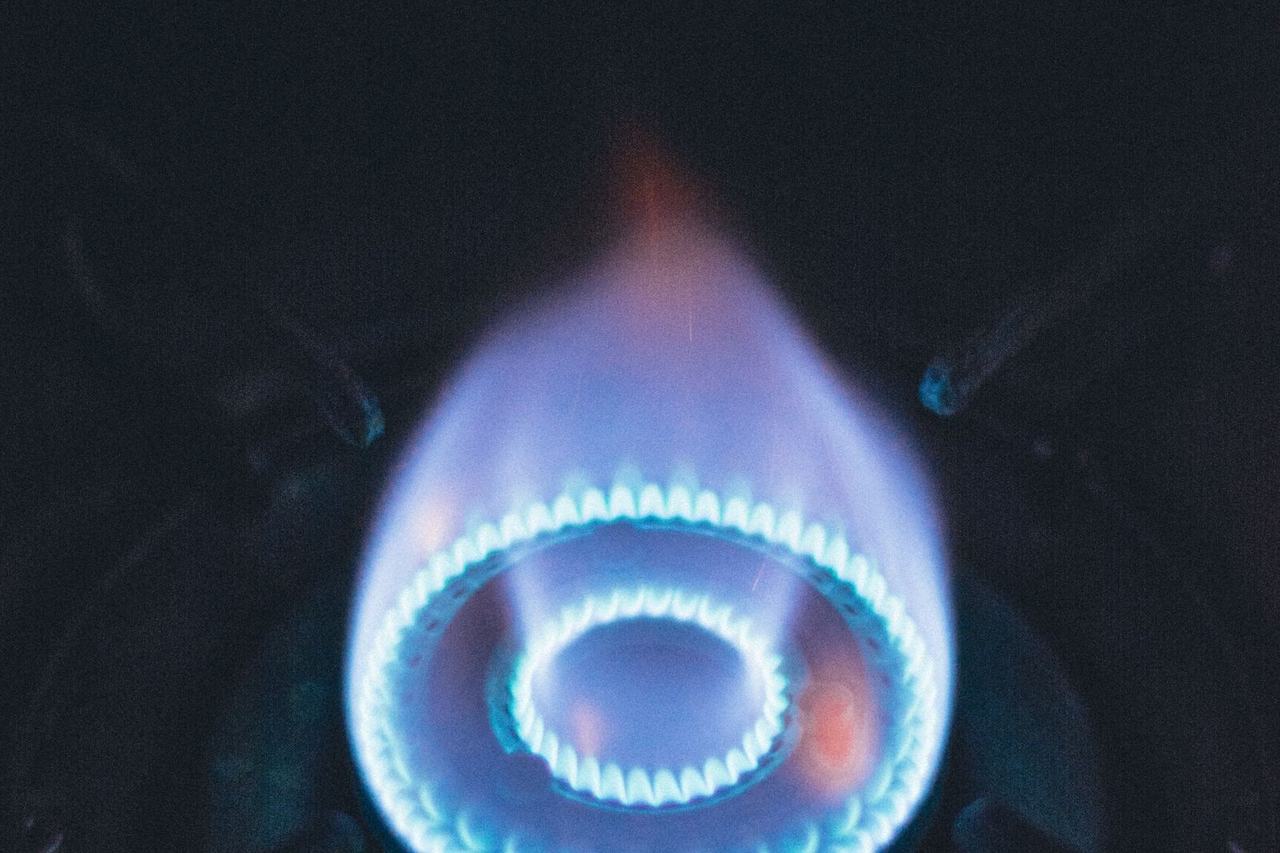 Blue flame on a gas stove burner