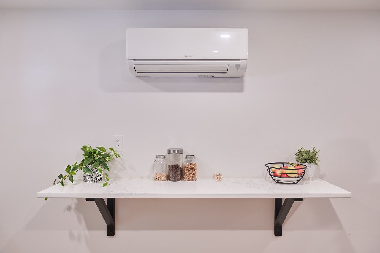 Wall-mounted ductless mini-split heat pump in a renovated Nanaimo home