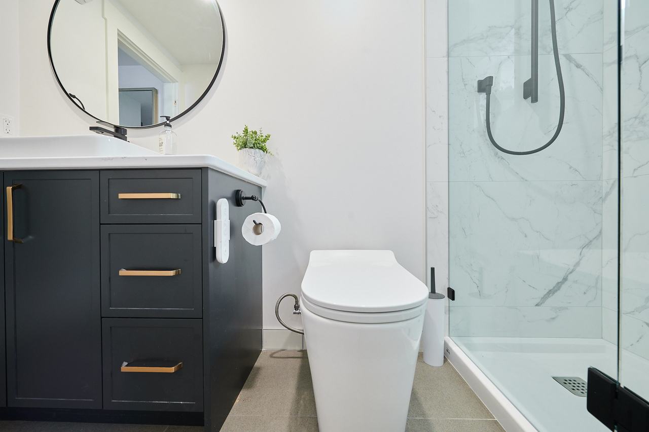 New wall-hung vanity, toilet and shower in a Nanaimo bathroom renovation